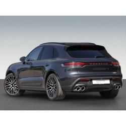 Black premium SUV in rear side view for professional background editing.