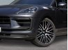 Detalle frontal y rueda de un SUV premium negro para eliminación profesional de fondo.